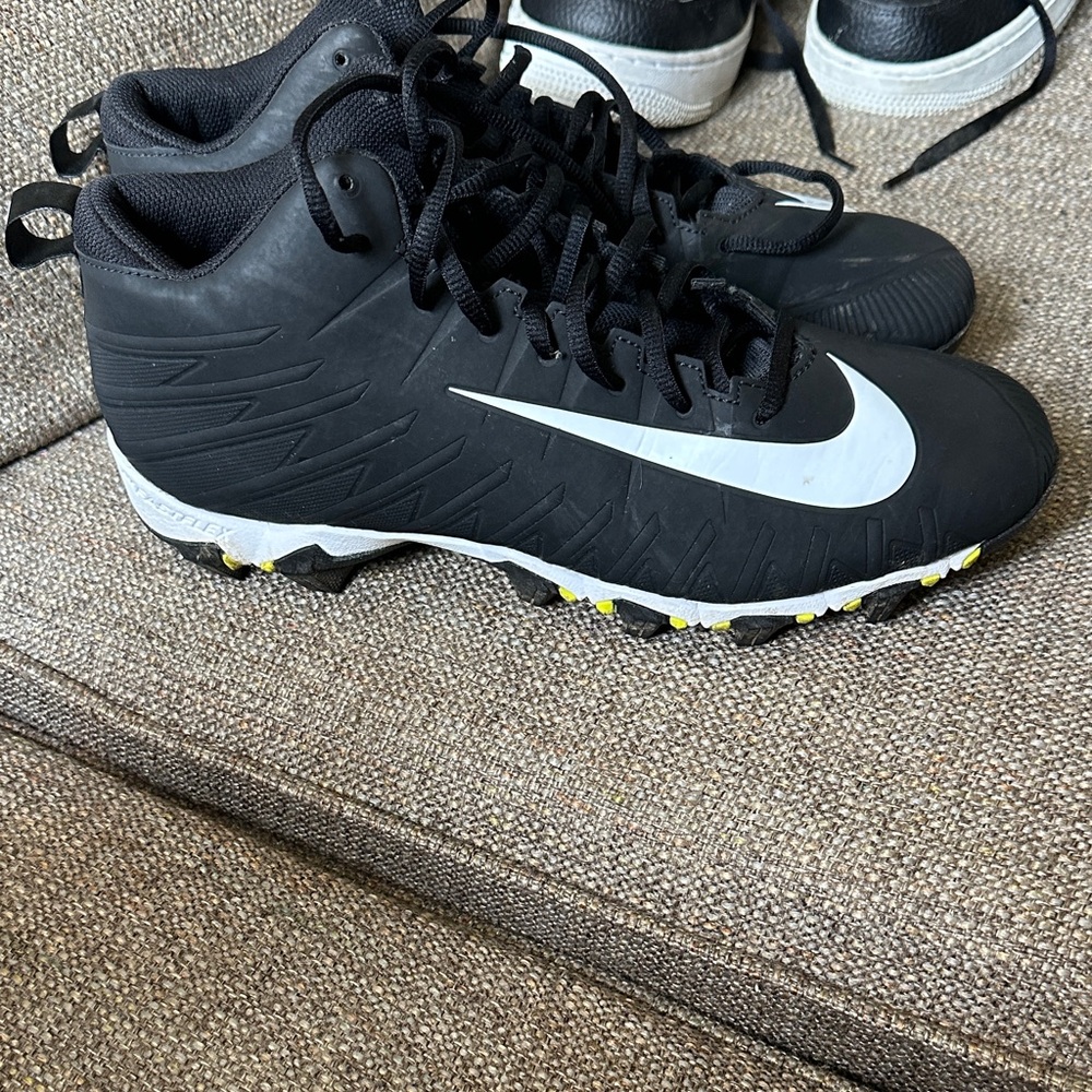 Nike Black and White High-Top Cleats